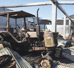 A tractor burnt by the protesters